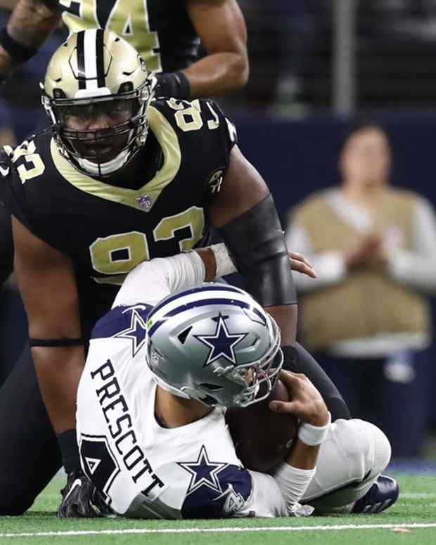 Onyemata Sacks Prescott